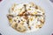 Perfect Turkish Ravioli and Chili Peppers Fried in Butter. Homemade delicious turkish manti  turkish ravioli  with yogurt and