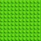 Perfect vector lego background of closeup plastic gloss construction block. Green.