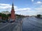 Perfect view from the bridge to the Kremlin, river and busy street