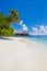 Perfect view of luxury water villas in Maldives island. Blue sea and blue sky, idyllic sea view from a wooden pier pathway