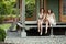 Perfect women friends in country house yard, lifestyle portrait