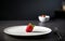 Perfectly Arranged Single Food on a Plain White Plate. Generative AI