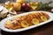 perfectly charred salmon on white platter, caramelized apple cider glaze