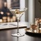 A perfectly clear martini glass filled with a classic martini