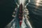 Perfectly synchronized rowing team captured in a stunning aerial view