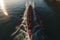 Perfectly synchronized rowing team captured in a stunning aerial view