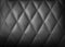 Perforated leather texture background for design, Dark black.