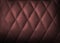 Perforated leather texture background for design, Dark red.