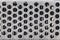 Perforated metal background. Grunge background of old iron with holes