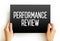 Performance Review - formal assessment in which a manager evaluates an employee`s work performance, text concept on card