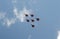 Performance of the Swifts aerobatic team on multi-purpose highly maneuverable MiG-29 fighters over the Myachkovo airfield