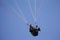 Performances on paragliding.Paraglider parachutist in flight