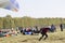 Performances on paragliding.Paraglider paratrooper prepare to fly