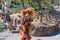 Performer at local san diego zoo USA california ion colorful mask and costume depicting african culture