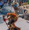 Performer at local san diego zoo USA california ion colorful mask and costume depicting african culture