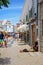 Performer in old town street, Lagos, Portugal.