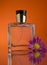 Perfume bottle with a flower