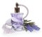 Perfume in the bottle and lavender pulverizer isolated on white