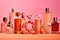 perfume bottles. a lot of transparent multi-colored glass bottles of cosmetics on a pink background. ai generative