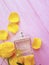 Perfume flower yellow blossom rose fragrance fresh decor on wooden background