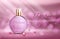 Perfume glass bottle light pink package design on pink background with glittering bokeh elements