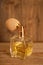 Perfume. Glass vintage perfume bottle with wooden