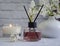 Perfume for home, flower, elegant  home relax comfort on a light background