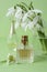 Perfume and snowdrop. Spring fragrance. Beauty and cosmetics