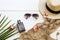 Perfume ,sunglasses ,hat ,crochet ,coconut leaf and flowers frangipani of accessories lifestyle woman