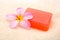 Perfumed soap and flower