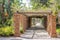 Pergola entrance with romantic tropical plants and flowers on a bright summer day in Port Elizabeth in South Africa