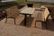 Pergola, garden pavilion is equipped with a metal grill. public barbecue place in the park. wooden camping tables. lawn around the