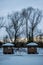 Pergolas on the shore of a frozen lake