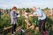 Perm, Russia - July 13.2016: Man and woman paint a wooden cross