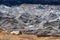 Permafrost Glacier with rocks and mud covered and small lake outbursts in the Himalayas of Nepal