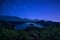 Perseid MEteor Shower over Bled Lake at Starry Dark Night in Summer