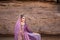Persia or Iran Women`s in persia traditional dress rock backgrou
