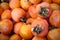 Persimmon fruit. Ripe kaki. Diospyros kaki Asian persimmon, Japanese persimmon. Fruit kaki background texture. Persimmon wallpap