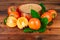 Persimmons with copper vase on old wood. Oriental East still life