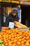 Persimmons is on the counter in the market of Mahane Yehuda in J