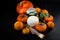 Persimmons, tangerines, oranges, cheese and