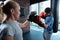 Persistent athletic man boxing hard in gym