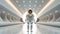 a person in an astronaut suit stands facing an empty white room that is very modern and minimally furnished