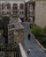 Person in Black Coat Walking among Historic Buildings in the Old Town of Baku, Azerbaijan