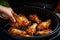 A person carefully adds a piece of chicken onto a sizzling grill, preparing a mouthwatering outdoor feast, Hand Grilling Chicken