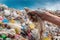 A person catches plastic waste floating on the surface of the sea with his hand, pollution of the world ocean,generative