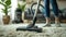 Person Cleaning Plush Carpet with Modern Vacuum Cleaner.