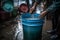 A person collecting rainwater in a bucketglobal water crisis AI generated