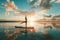 A person confidently balances on a surfboard as they ride the waves in the water, A person doing yoga on a paddleboard on calm