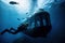 person, diving in submersible to explore underwater world, with fish swimming nearby
